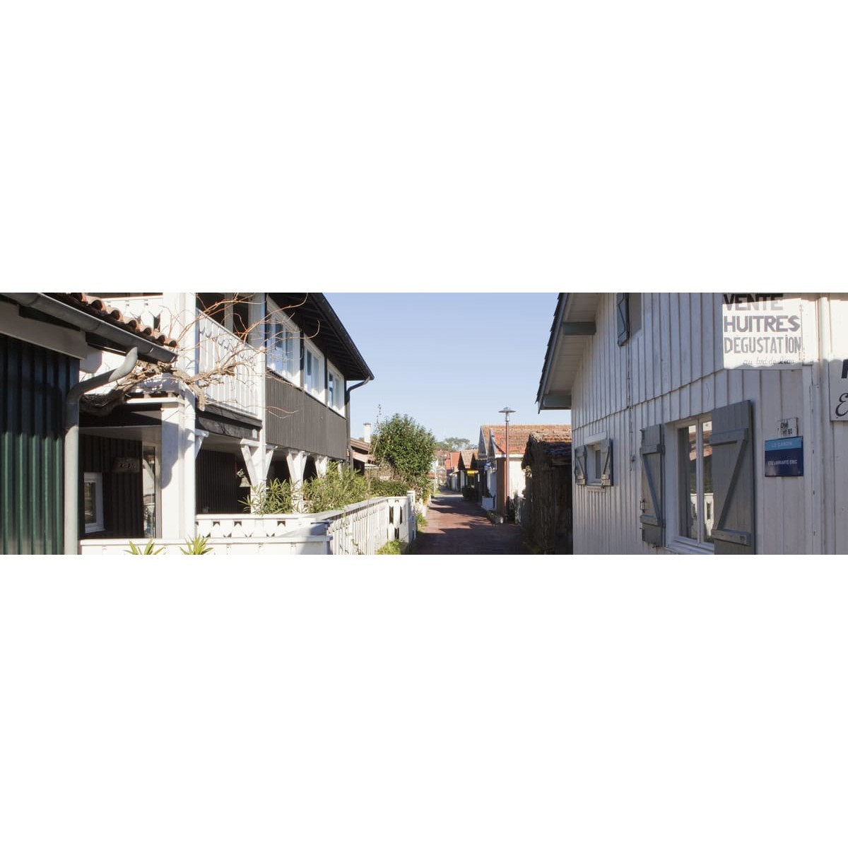 Tableau sur toile cabanes Cap Ferret 30x97 cm Tableau sur toile cabanes Cap Ferret 30x97 cm